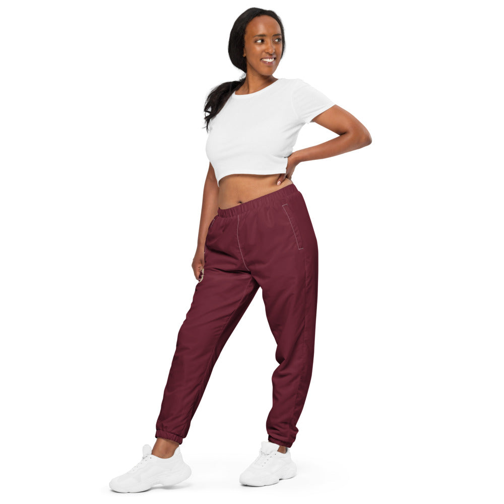 Pantalon de survêtement large unisexe Les Poneys du Roheryn, Blanc, porté par une femme, vue trois quarts